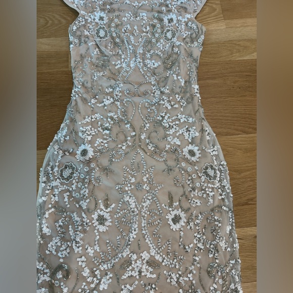 DB STUDIO
Short Cap Sleeve Dress with Allover Beading
STYLE# 141706350 - Picture 5 of 5